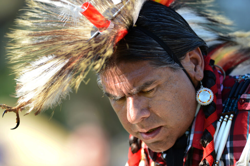 Johnny Velasquez, an Apache from New Mexico, honors his heritage during the inter-tribal dance at the Native American Veterans Association's Pow Wow in South Gate, California.