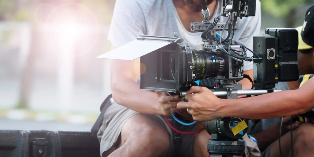 Behind the scenes of movie shooting or video production. Native Reach.
